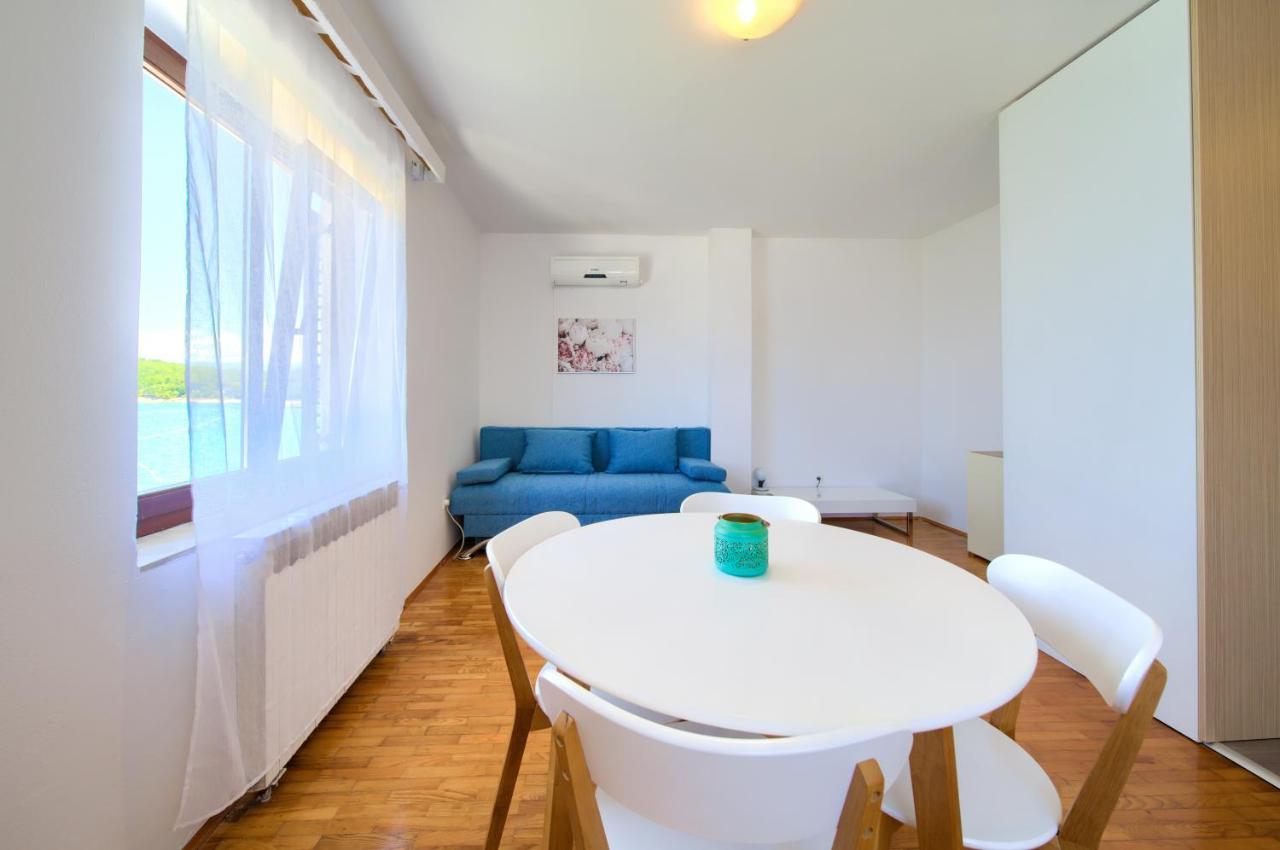 Apartments Dundo Njivice Extérieur photo